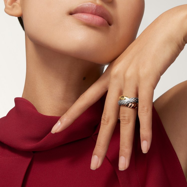 Cartier TRINITY ring 18k yellow gold with black leopard print lacquer 18k rose gold with black tiger stripe lacquer 18k white gold with diamond-set snake scale pattern 7