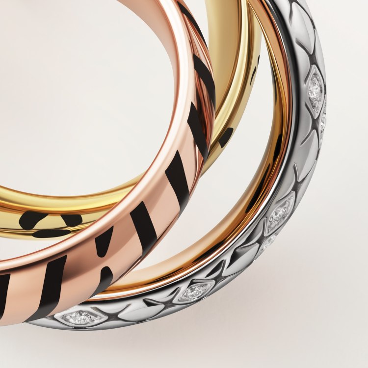 Cartier TRINITY ring 18k yellow gold with black leopard print lacquer 18k rose gold with black tiger stripe lacquer 18k white gold with diamond-set snake scale pattern 7