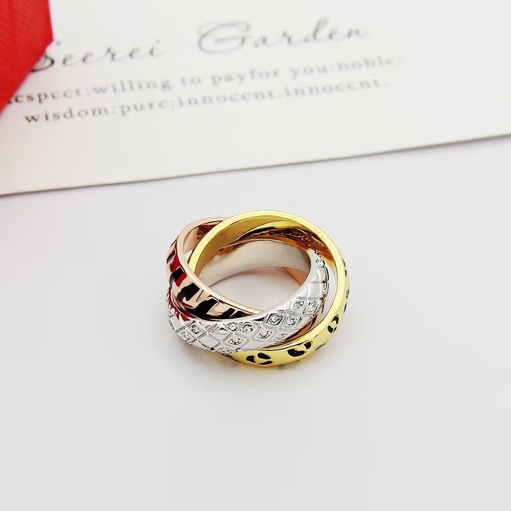 Cartier TRINITY ring 18k yellow gold with black leopard print lacquer 18k rose gold with black tiger stripe lacquer 18k white gold with diamond-set snake scale pattern 7