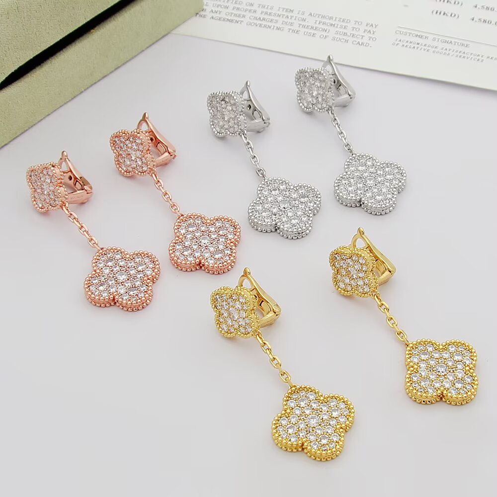 Van Cleef Arpels Magic Alhambra earrings 18k rose gold 18k yellow gold 18k white gold with clear pave diamonds 3cm drop length