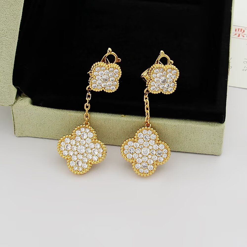 Van Cleef Arpels Magic Alhambra earrings 18k rose gold 18k yellow gold 18k white gold with clear pave diamonds 3cm drop length