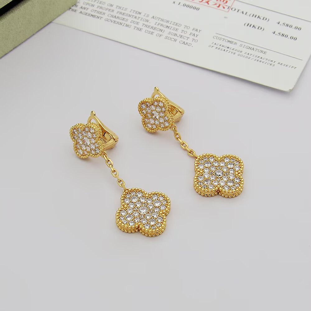 Van Cleef Arpels Magic Alhambra earrings 18k rose gold 18k yellow gold 18k white gold with clear pave diamonds 3cm drop length