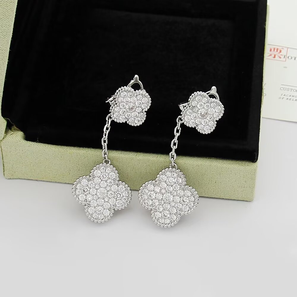 Van Cleef Arpels Magic Alhambra earrings 18k rose gold 18k yellow gold 18k white gold with clear pave diamonds 3cm drop length