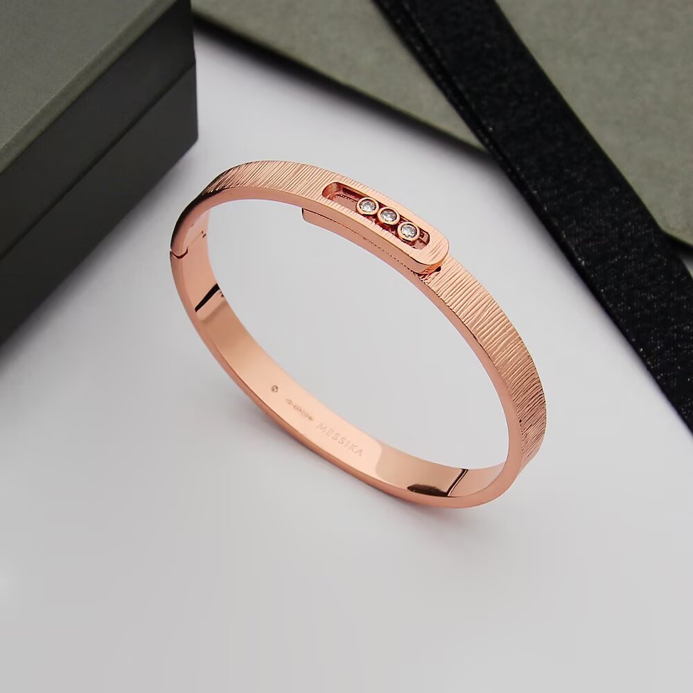 Messika Move Noa bracelet 18K rose gold 18K white gold 18K yellow gold with clear diamond accents 17cm