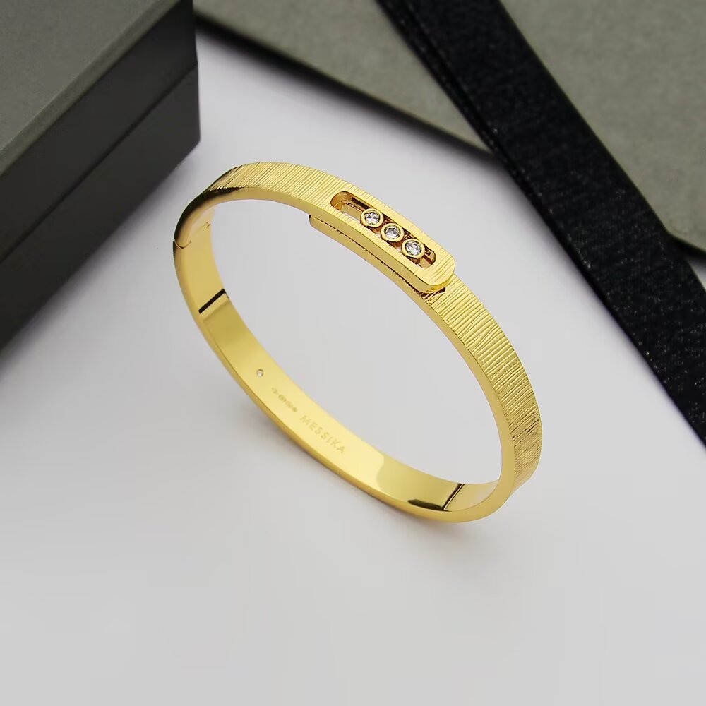 Messika Move Noa bracelet 18K rose gold 18K white gold 18K yellow gold with clear diamond accents 17cm