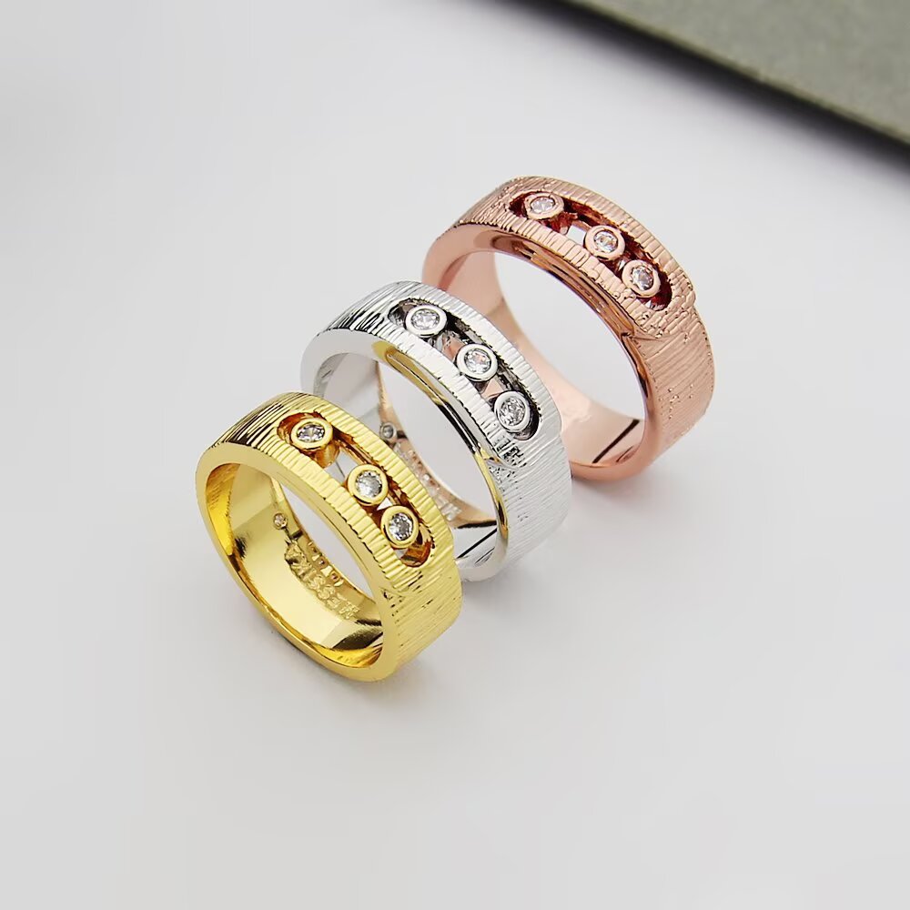 Messika Move Noa ring 18k yellow gold 18k white gold 18k rose gold with clear round diamonds brushed textured metal finish 6 7 8 9