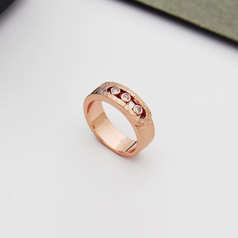 Messika Move Noa ring 18k yellow gold 18k white gold 18k rose gold with clear round diamonds brushed textured metal finish 6 7 8 9