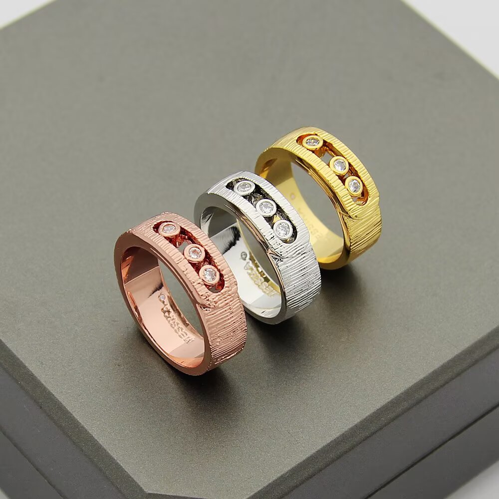 Messika Move Noa ring 18k yellow gold 18k white gold 18k rose gold with clear round diamonds brushed textured metal finish 6 7 8 9