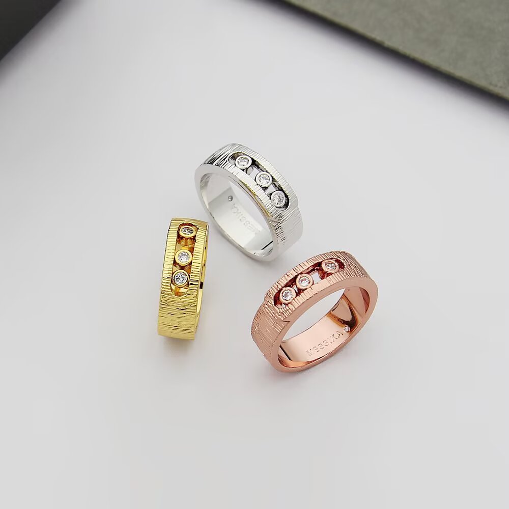 Messika Move Noa ring 18k yellow gold 18k white gold 18k rose gold with clear round diamonds brushed textured metal finish 6 7 8 9
