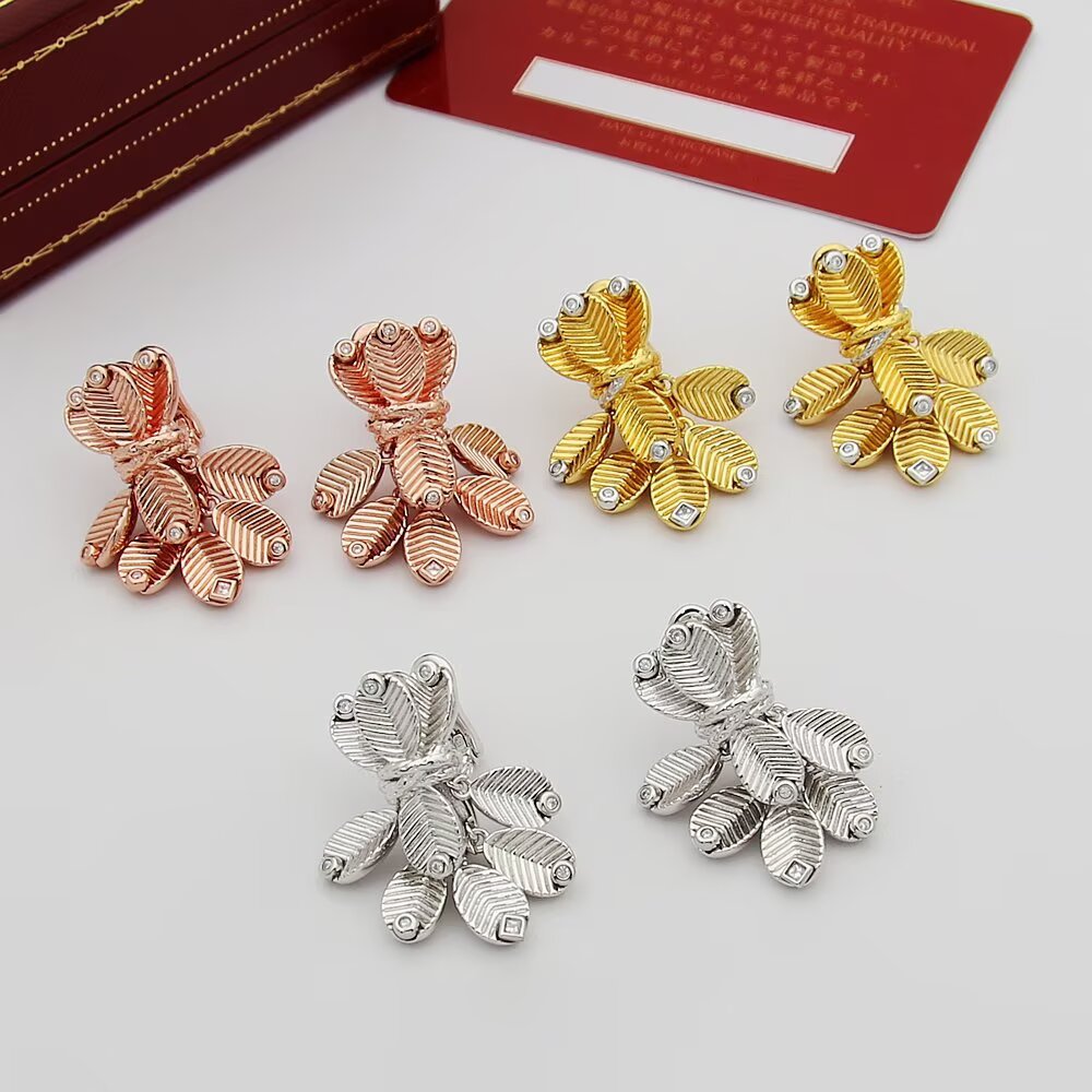 Cartier Grain de Cafe earrings Yellow gold with white gold accents and diamond accents One Size