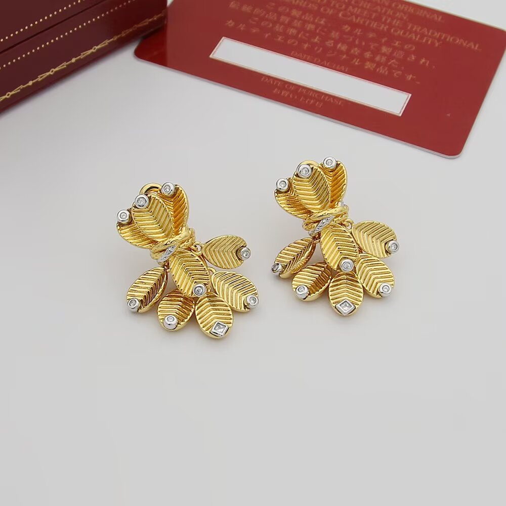 Cartier Grain de Cafe earrings Yellow gold with white gold accents and diamond accents One Size