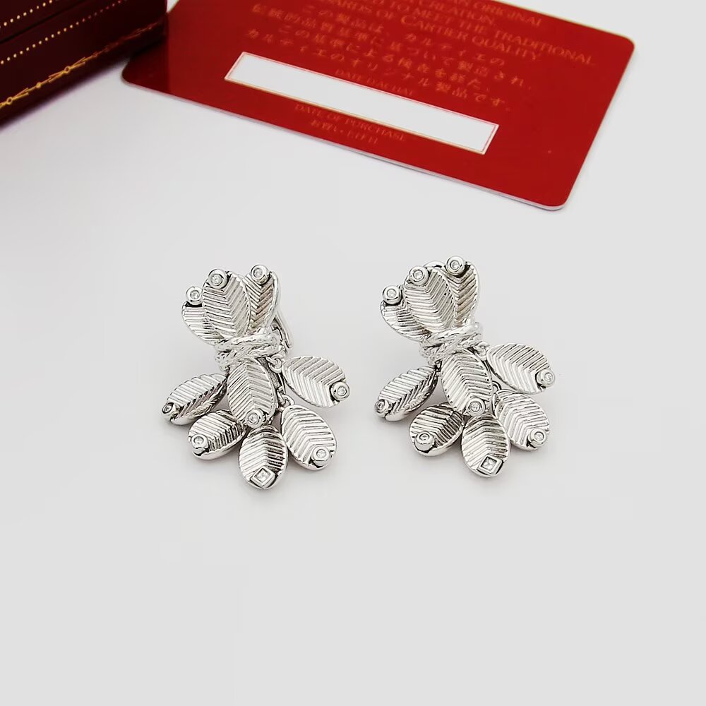 Cartier Grain de Cafe earrings Yellow gold with white gold accents and diamond accents One Size