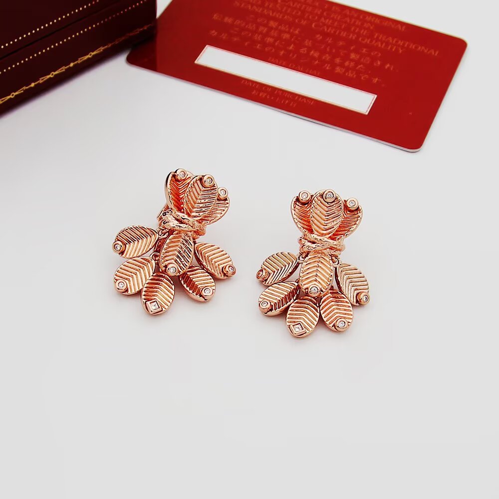 Cartier Grain de Cafe earrings Yellow gold with white gold accents and diamond accents One Size