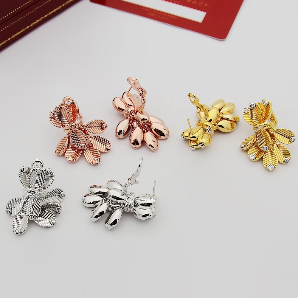 Cartier Grain de Cafe earrings Yellow gold with white gold accents and diamond accents One Size