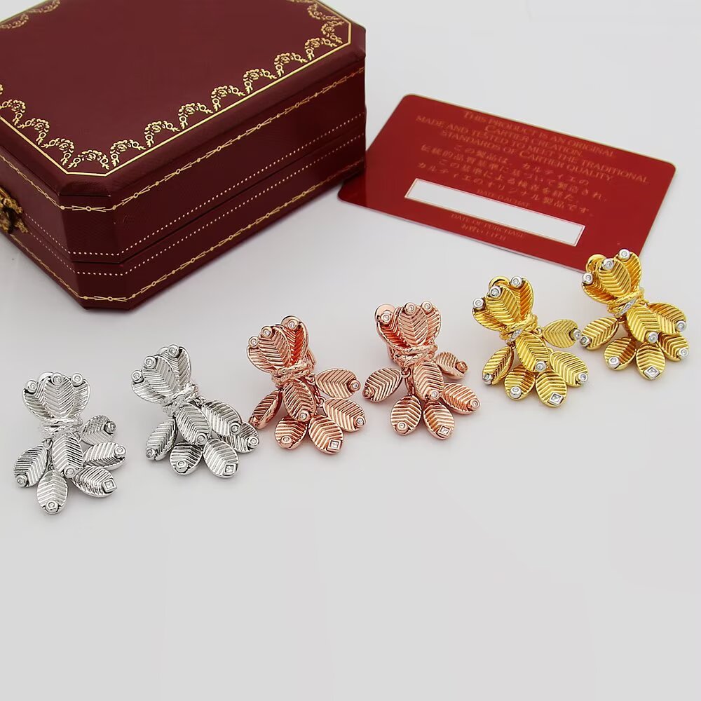 Cartier Grain de Cafe earrings Yellow gold with white gold accents and diamond accents One Size