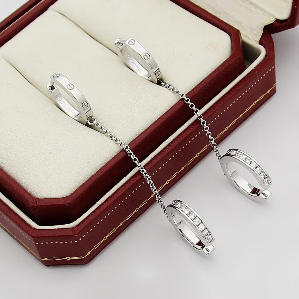 Cartier Love earrings Yellow gold with clear round-cut diamonds 12mm hoop diameter 30mm chain length