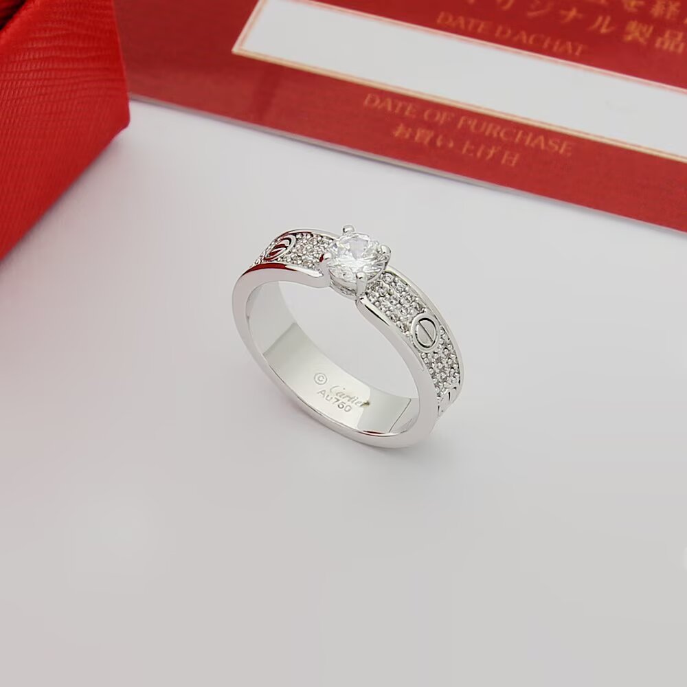 Cartier Love ring 18k rose gold with clear diamond accents 6