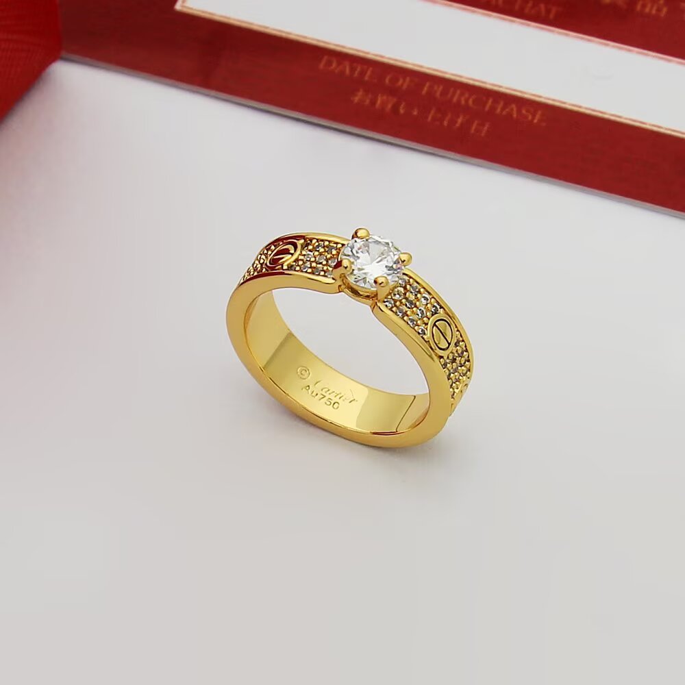 Cartier Love ring 18k rose gold with clear diamond accents 6