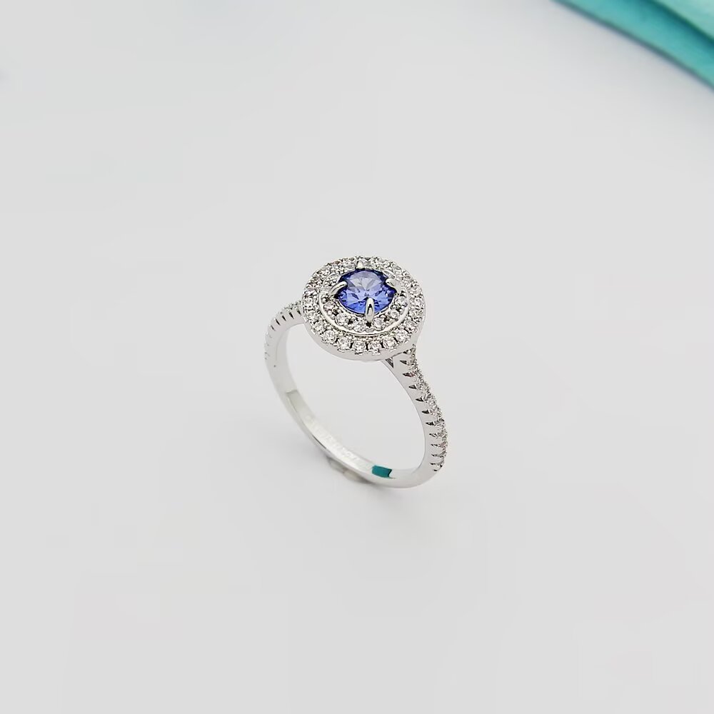 Tiffany Tiffany Soleste ring silver-toned white metal with white diamond accents and colored center stones emerald green ruby red tanzanite purple orange garnet 7