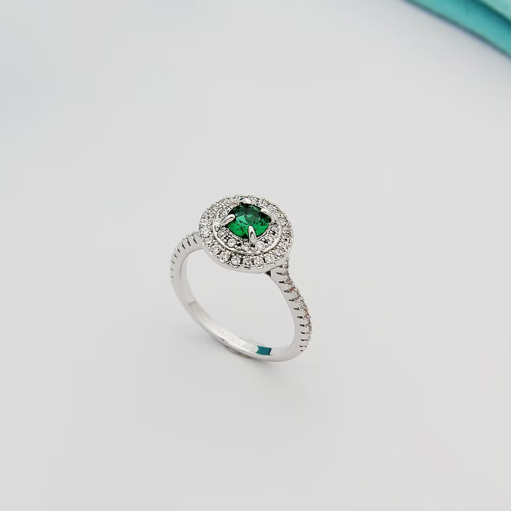 Tiffany Tiffany Soleste ring silver-toned white metal with white diamond accents and colored center stones emerald green ruby red tanzanite purple orange garnet 7
