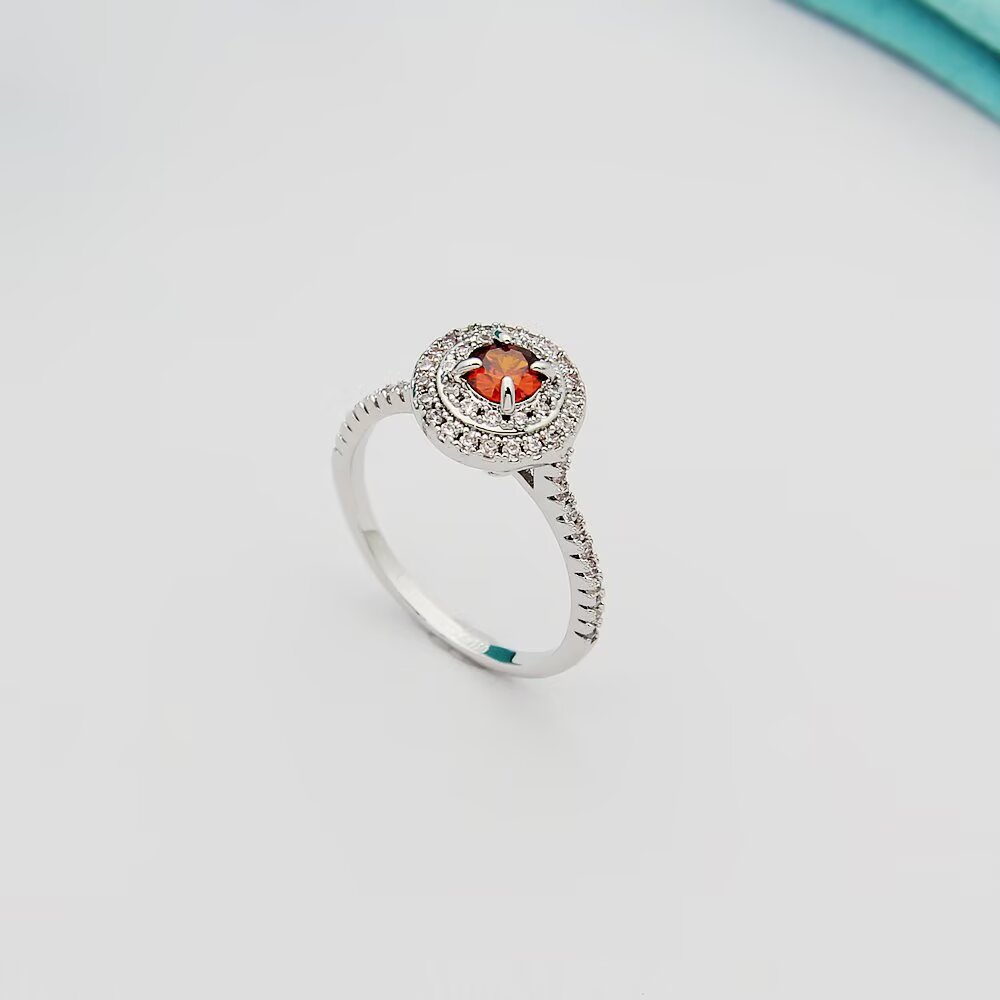 Tiffany Tiffany Soleste ring silver-toned white metal with white diamond accents and colored center stones emerald green ruby red tanzanite purple orange garnet 7