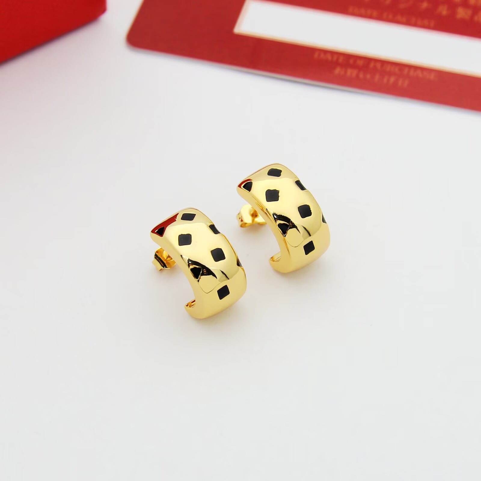 Cartier Panthere de Cartier earrings 18k yellow gold 18k white gold 18k rose gold with black lacquer spots 12mm hoop diameter