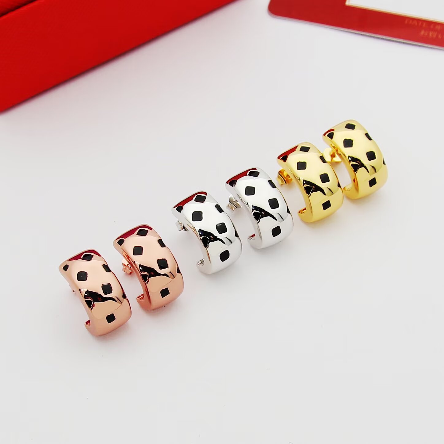 Cartier Panthere de Cartier earrings 18k yellow gold 18k white gold 18k rose gold with black lacquer spots 12mm hoop diameter
