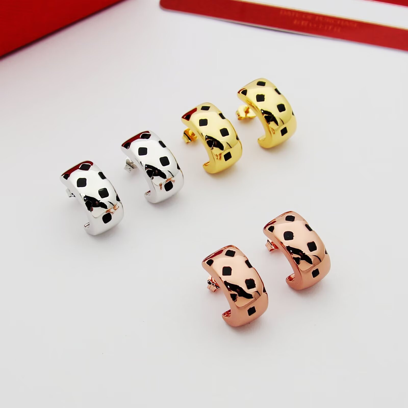 Cartier Panthere de Cartier earrings 18k yellow gold 18k white gold 18k rose gold with black lacquer spots 12mm hoop diameter