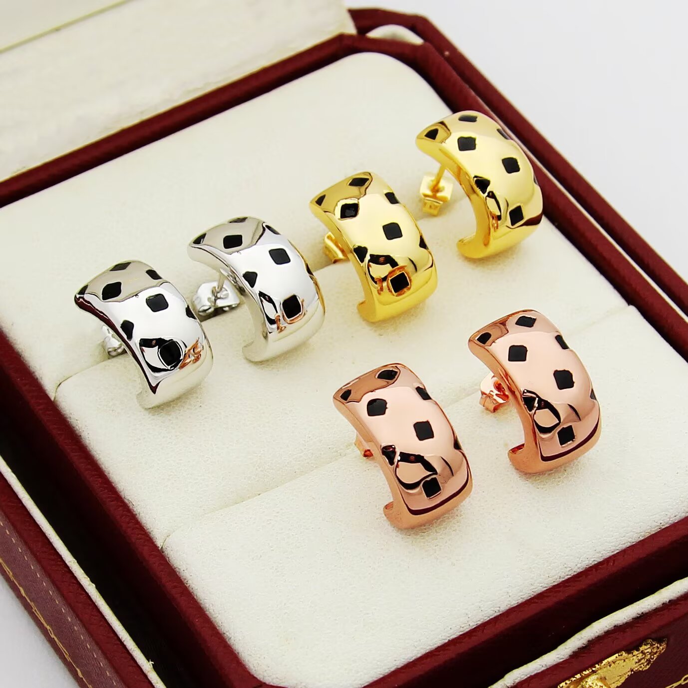 Cartier Panthere de Cartier earrings 18k yellow gold 18k white gold 18k rose gold with black lacquer spots 12mm hoop diameter