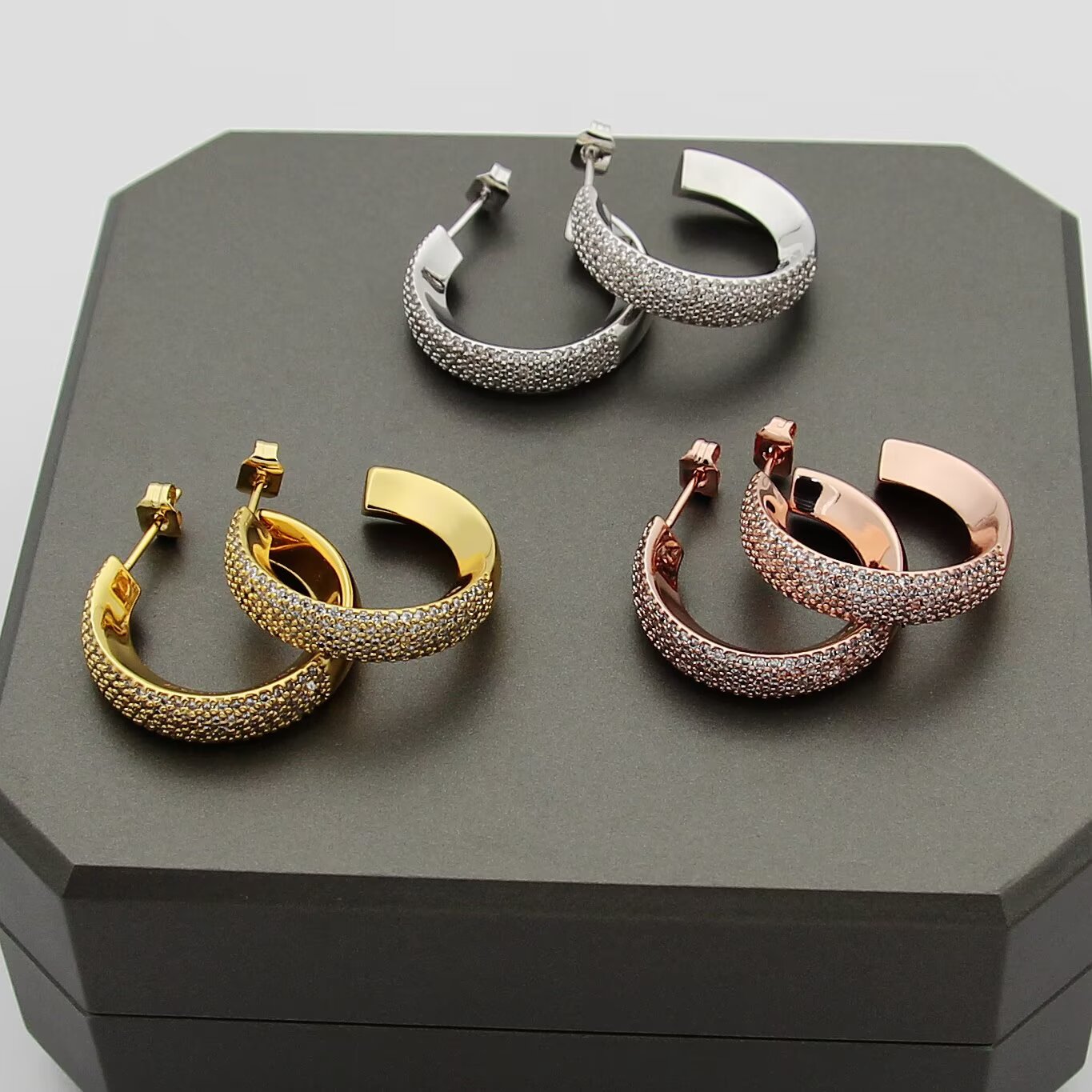 Messika Move Series Pave Hoop Earrings earrings Available in rhodium-plated silver-toned metal yellow gold-toned metal and rose gold-toned metal all set with clear pave diamonds 20mm outer hoop diameter