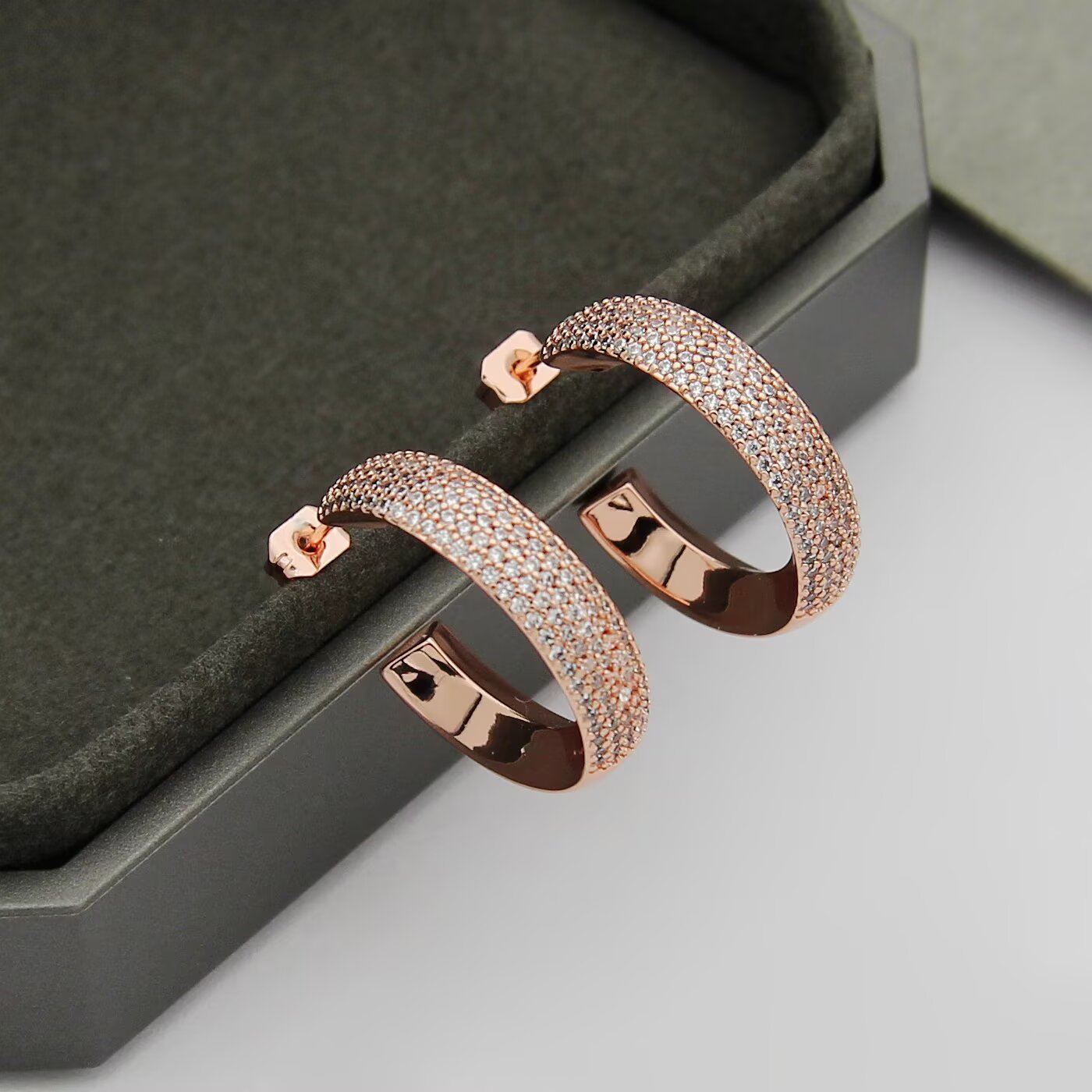 Messika Move Series Pave Hoop Earrings earrings Available in rhodium-plated silver-toned metal yellow gold-toned metal and rose gold-toned metal all set with clear pave diamonds 20mm outer hoop diameter