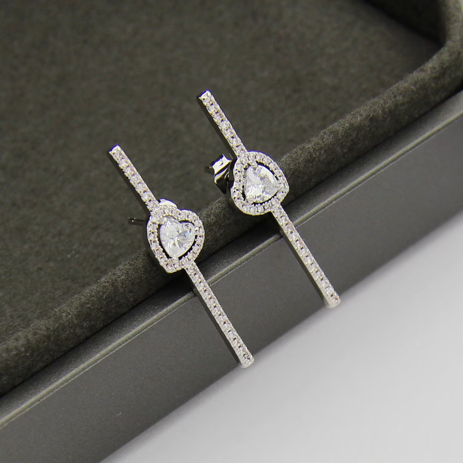Messika Joy C ur earrings 18K white gold 18K rose gold 18K yellow gold with clear diamonds single earring 0 15 carat heart-shaped center diamond
