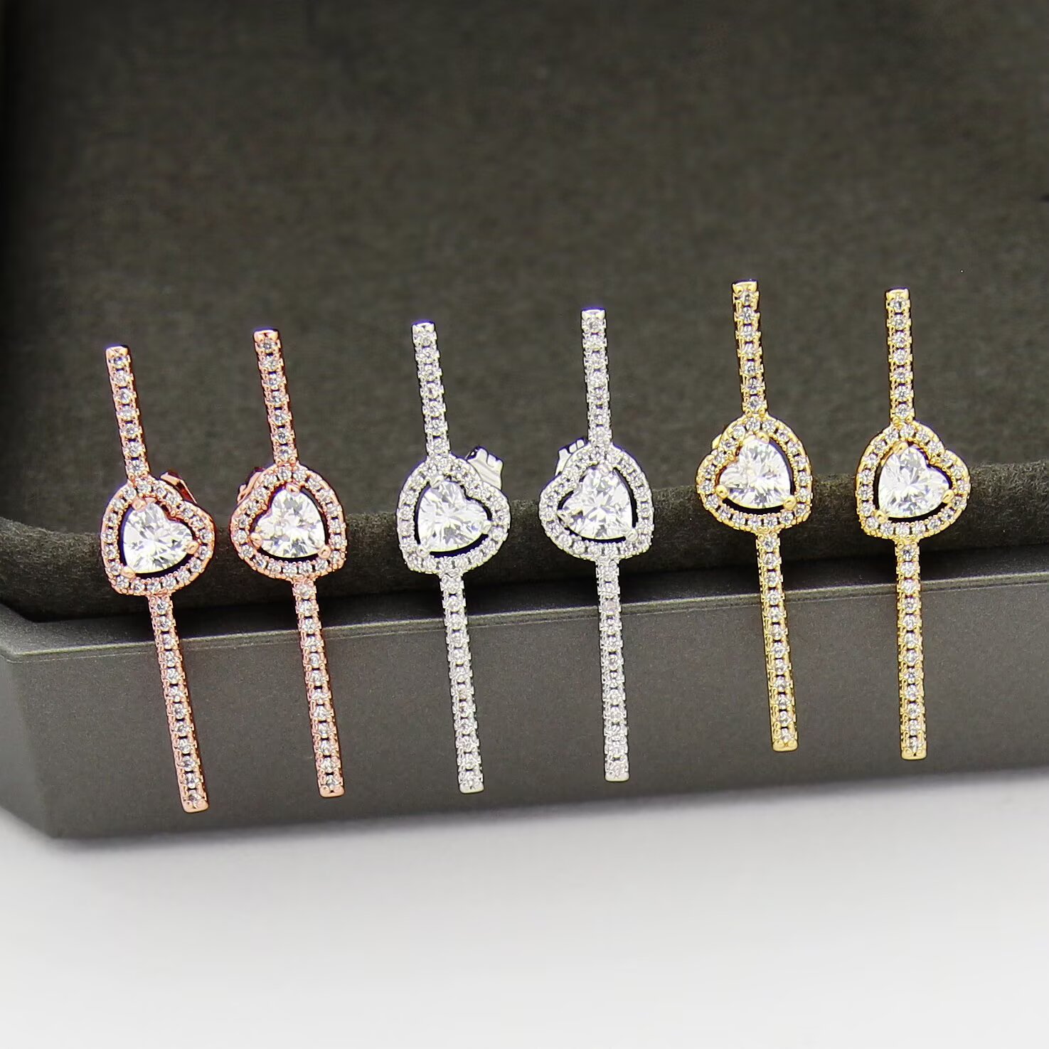 Messika Joy C ur earrings 18K white gold 18K rose gold 18K yellow gold with clear diamonds single earring 0 15 carat heart-shaped center diamond