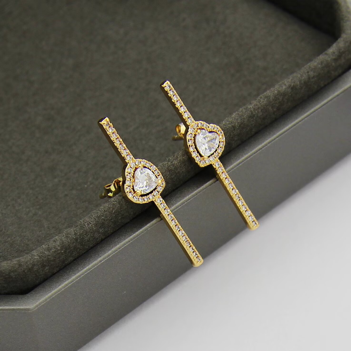 Messika Joy C ur earrings 18K white gold 18K rose gold 18K yellow gold with clear diamonds single earring 0 15 carat heart-shaped center diamond