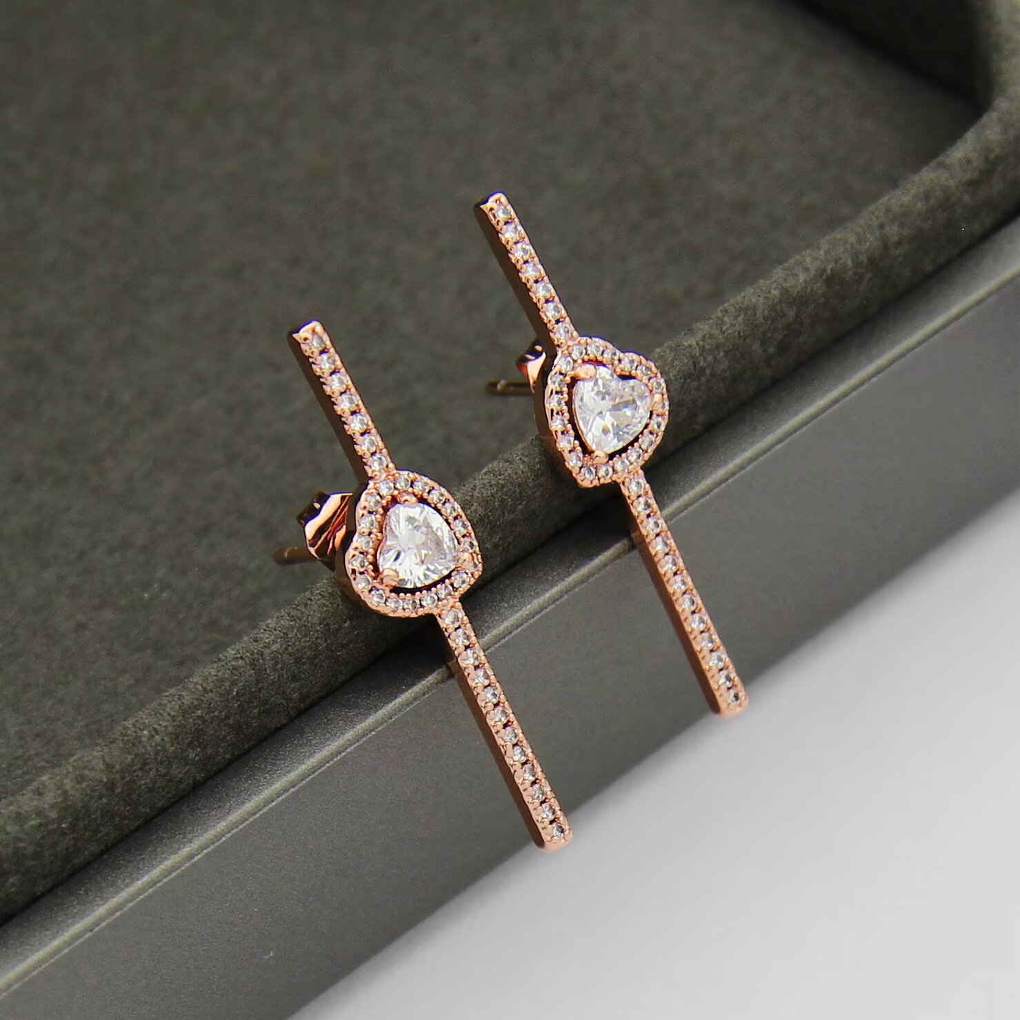 Messika Joy C ur earrings 18K white gold 18K rose gold 18K yellow gold with clear diamonds single earring 0 15 carat heart-shaped center diamond