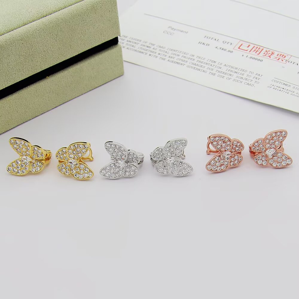 Van Cleef Arpels Two Butterfly earrings 18K yellow gold with clear diamonds 18K white gold with clear diamonds 18K rose gold with clear diamonds One Size