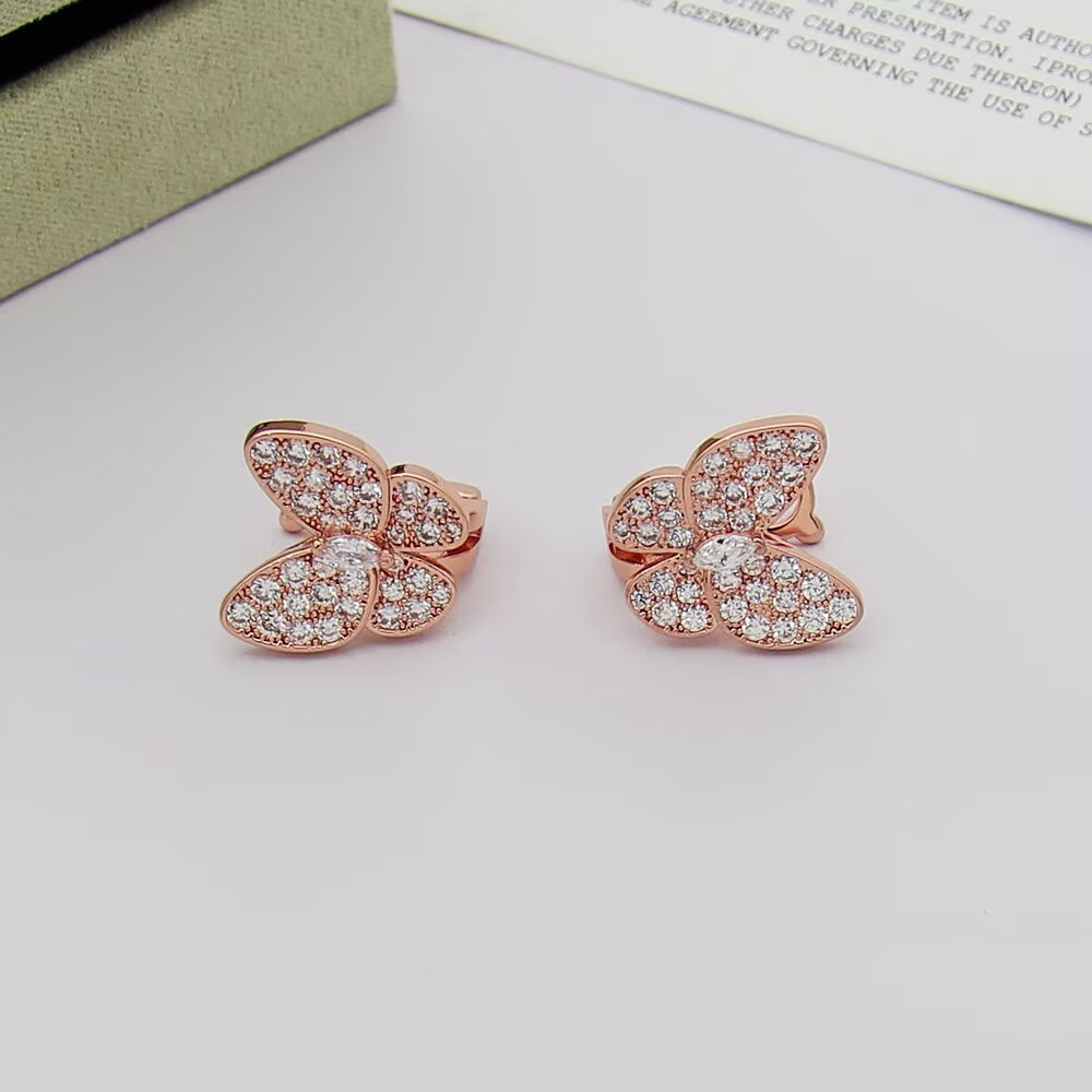 Van Cleef Arpels Two Butterfly earrings 18K yellow gold with clear diamonds 18K white gold with clear diamonds 18K rose gold with clear diamonds One Size