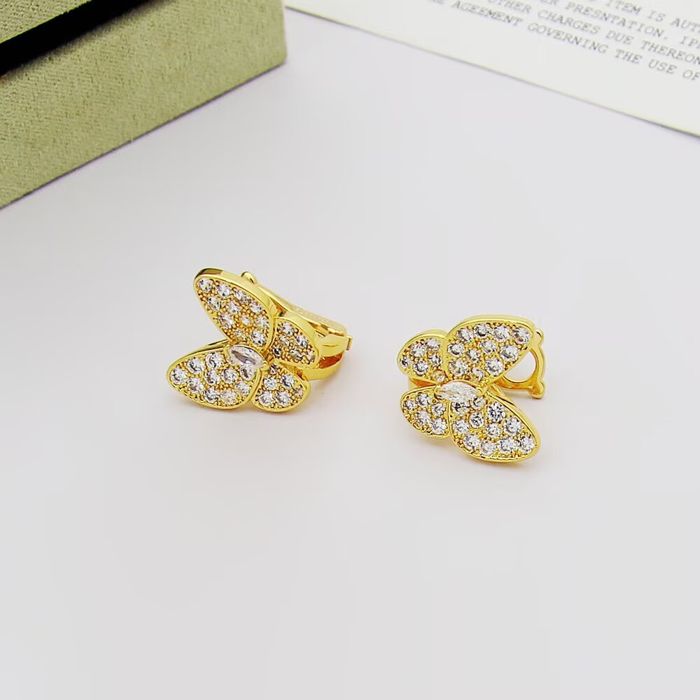 Van Cleef Arpels Two Butterfly earrings 18K yellow gold with clear diamonds 18K white gold with clear diamonds 18K rose gold with clear diamonds One Size