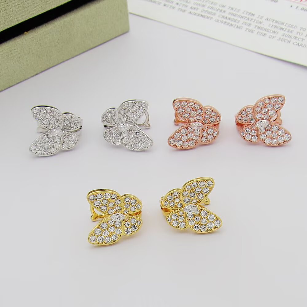 Van Cleef Arpels Two Butterfly earrings 18K yellow gold with clear diamonds 18K white gold with clear diamonds 18K rose gold with clear diamonds One Size