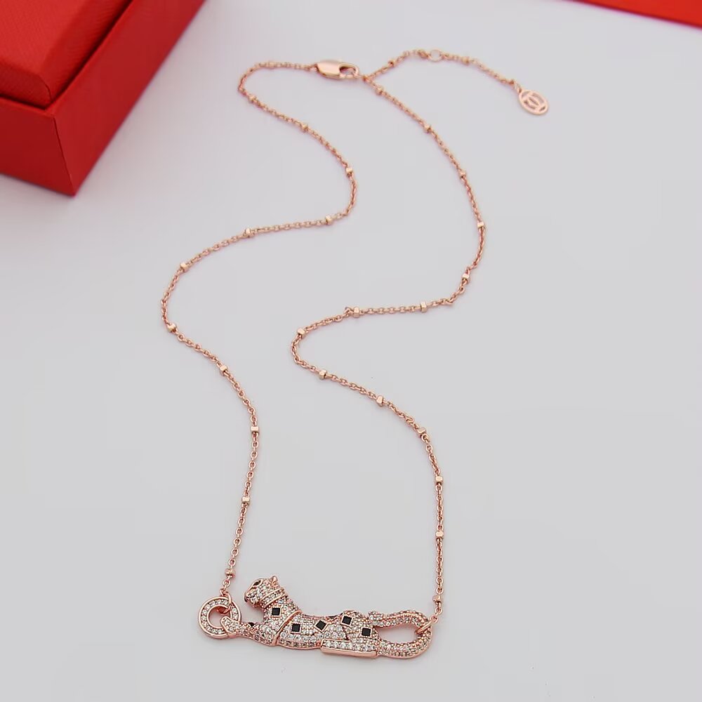 Cartier Panthere de Cartier necklace 18k yellow gold paved clear diamonds black onyx spots tsavorite garnet eyes 42cm