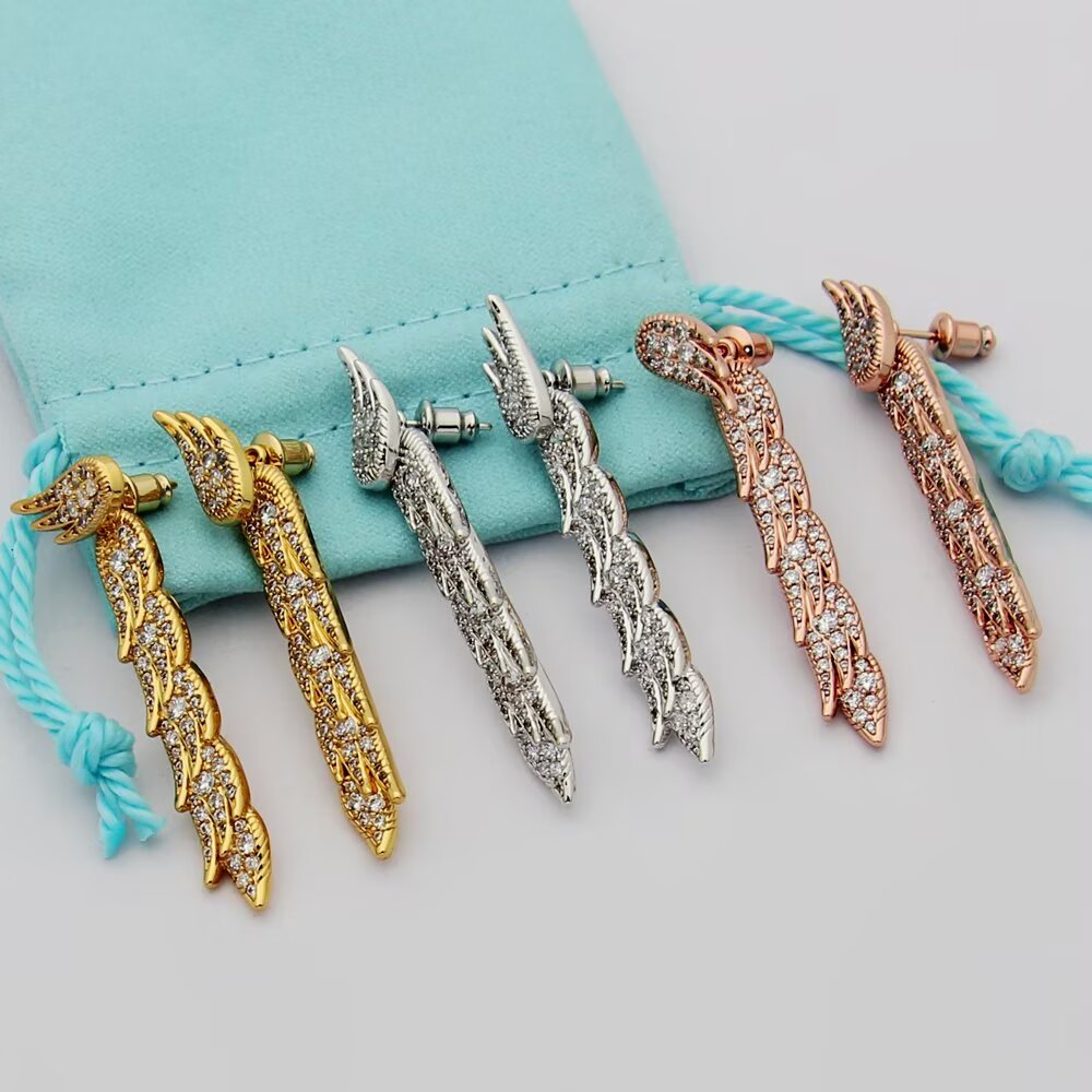 Tiffany Feather Drop Earrings earrings Sterling silver with clear diamond pave available variants in yellow gold rose gold with clear diamond pave 4cm drop length