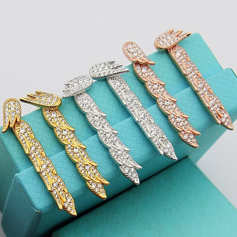 Tiffany Feather Drop Earrings earrings Sterling silver with clear diamond pave available variants in yellow gold rose gold with clear diamond pave 4cm drop length