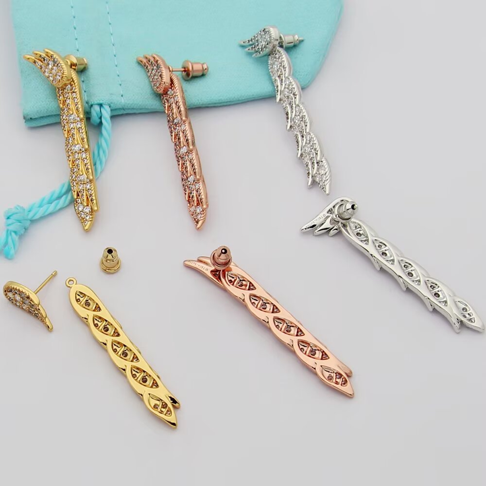 Tiffany Feather Drop Earrings earrings Sterling silver with clear diamond pave available variants in yellow gold rose gold with clear diamond pave 4cm drop length
