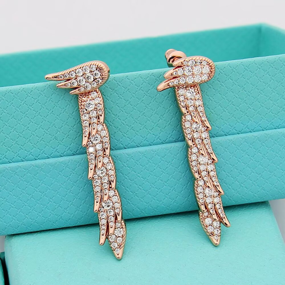 Tiffany Feather Drop Earrings earrings Sterling silver with clear diamond pave available variants in yellow gold rose gold with clear diamond pave 4cm drop length