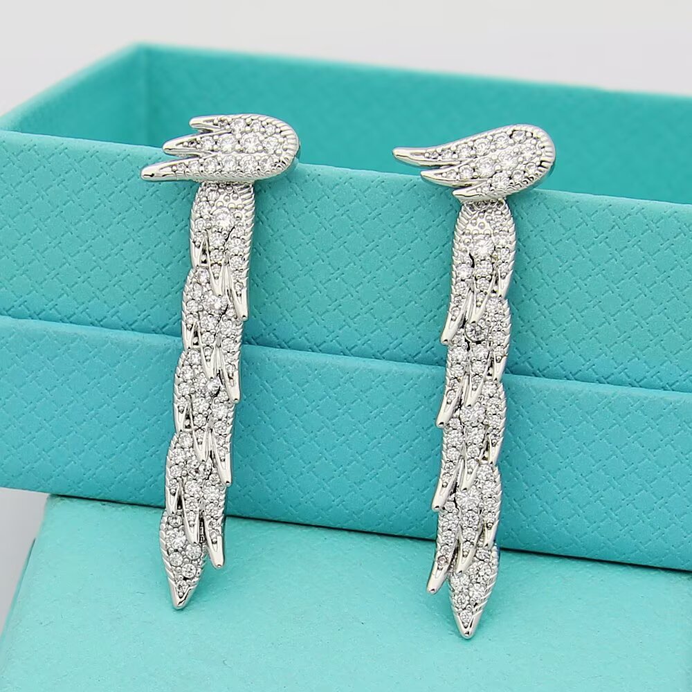 Tiffany Feather Drop Earrings earrings Sterling silver with clear diamond pave available variants in yellow gold rose gold with clear diamond pave 4cm drop length
