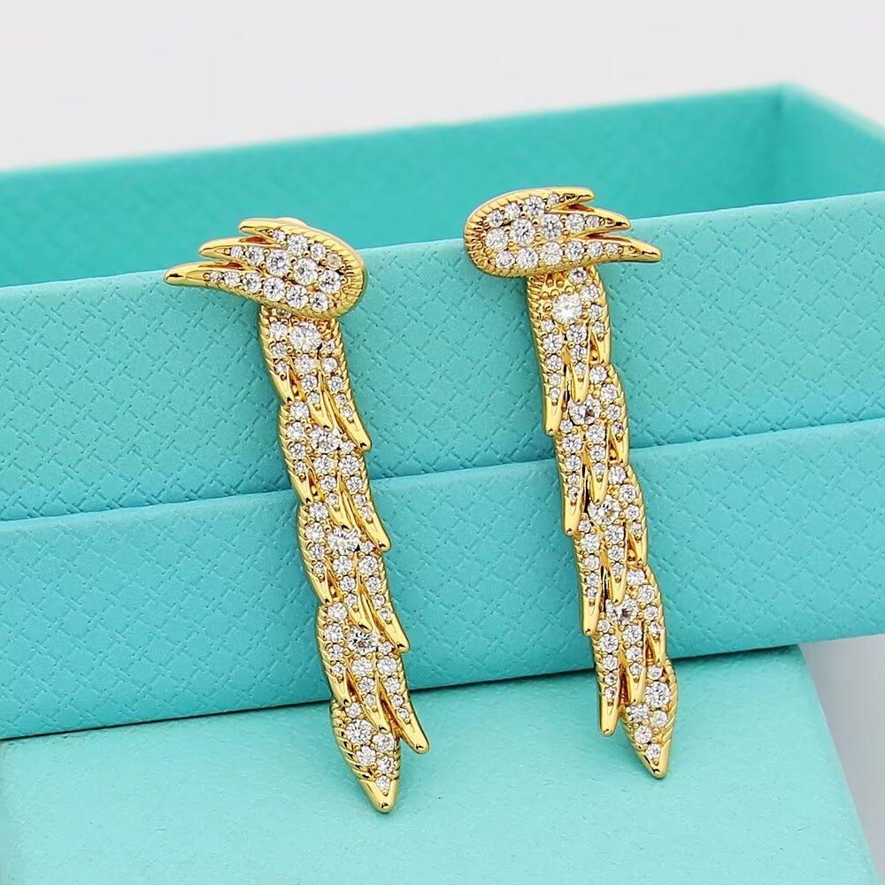 Tiffany Feather Drop Earrings earrings Sterling silver with clear diamond pave available variants in yellow gold rose gold with clear diamond pave 4cm drop length