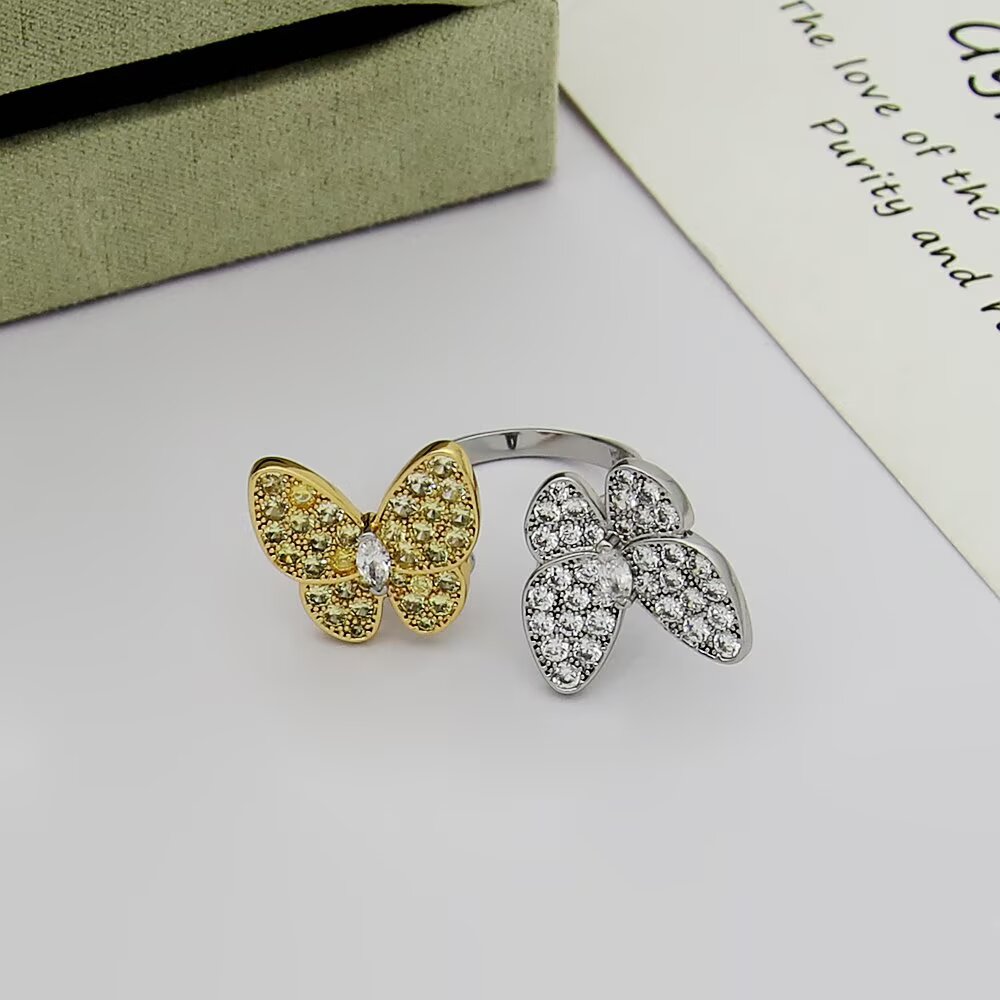 Van Cleef Arpels Two Butterfly ring 18k white gold with colorless diamonds 18k rose gold with pink sapphires 18k yellow gold with yellow sapphires US 7