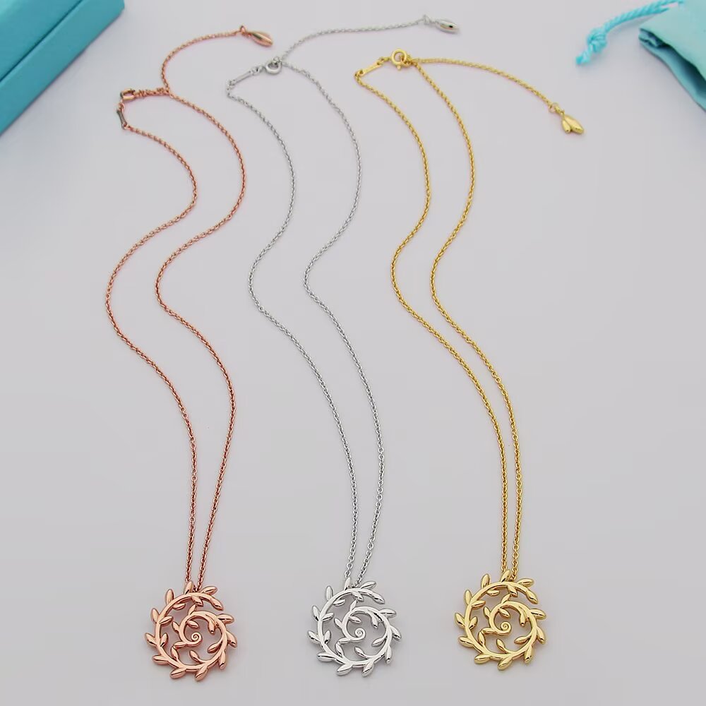 Tiffany Co Paloma Picasso Olive Leaf Spiral necklace 18k yellow gold 18 inches
