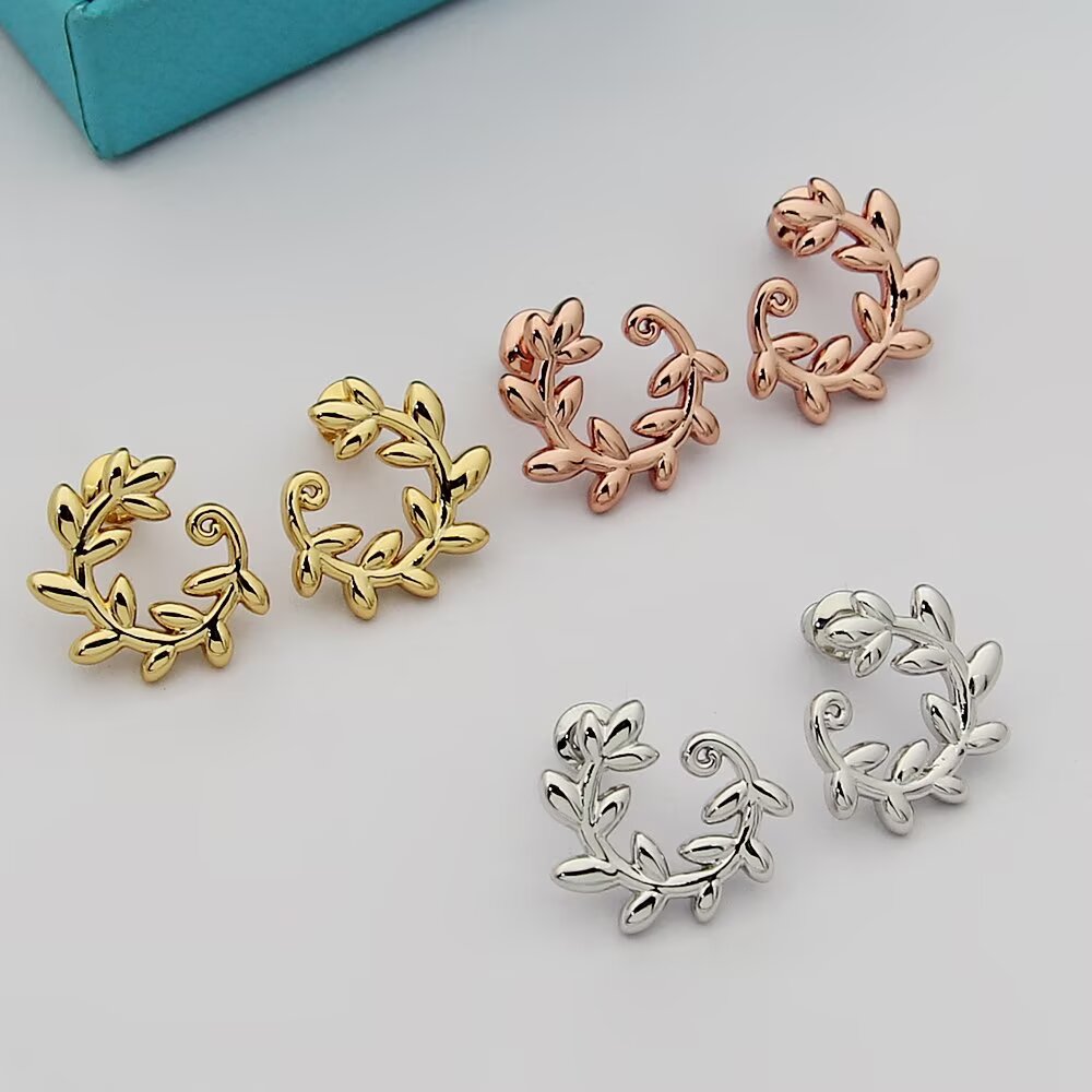 Tiffany Olive Leaf earrings 18k yellow gold no gemstones 15mm diameter