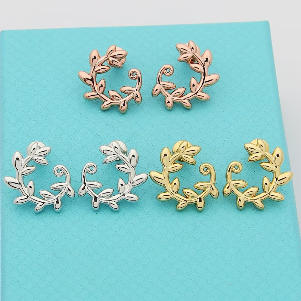 Tiffany Olive Leaf earrings 18k yellow gold no gemstones 15mm diameter